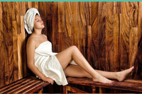 Pourquoi et utiliser et comment choisir un sauna infrarouge? femme allongée sauna infrarouge